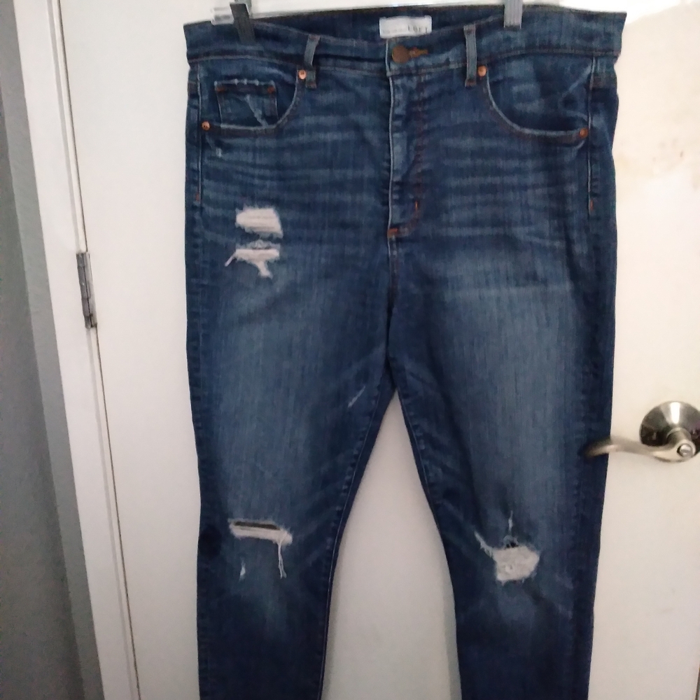 Distressed Blue Jeans